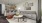 a living room with a couch and a table