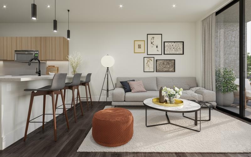 a well-lit living room with a couch and a table